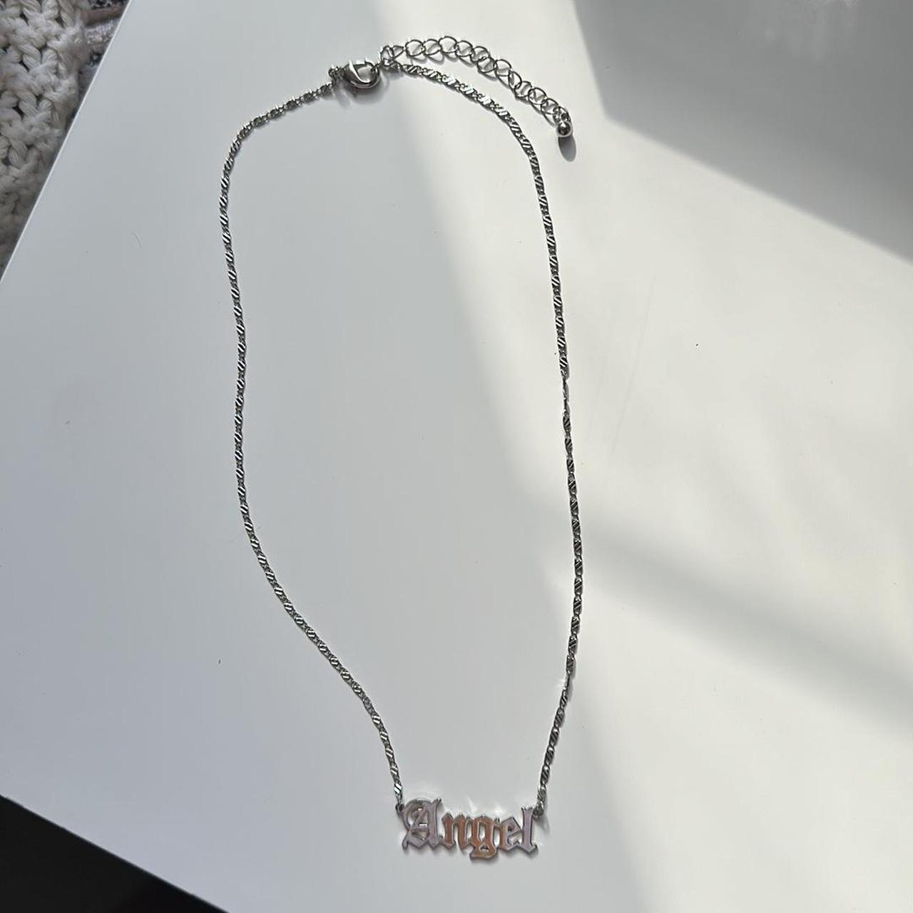 Forever 21 Silver Angel necklace super cute! Depop