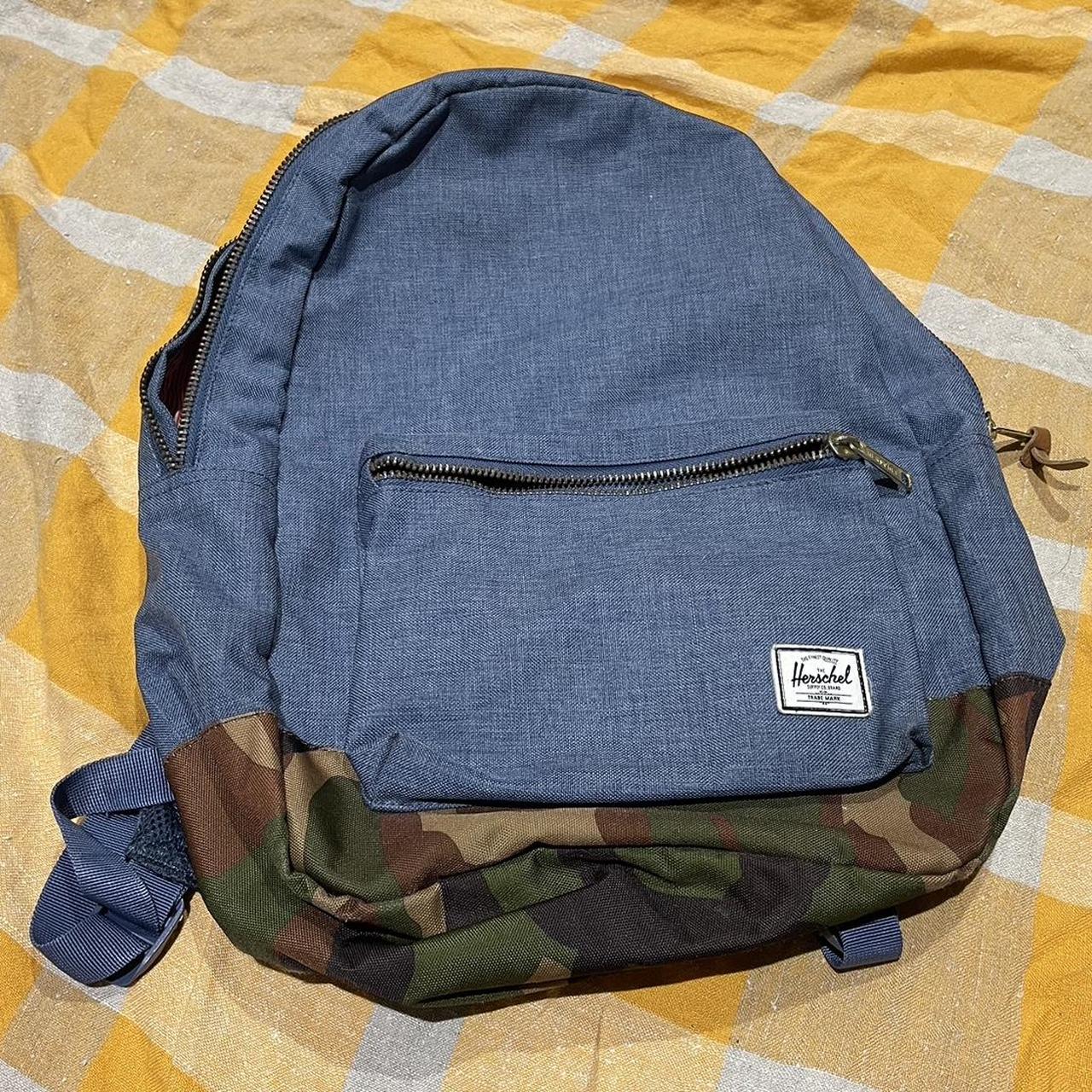 Blue canvas and camouflage Herschel laptop backpack.... Depop