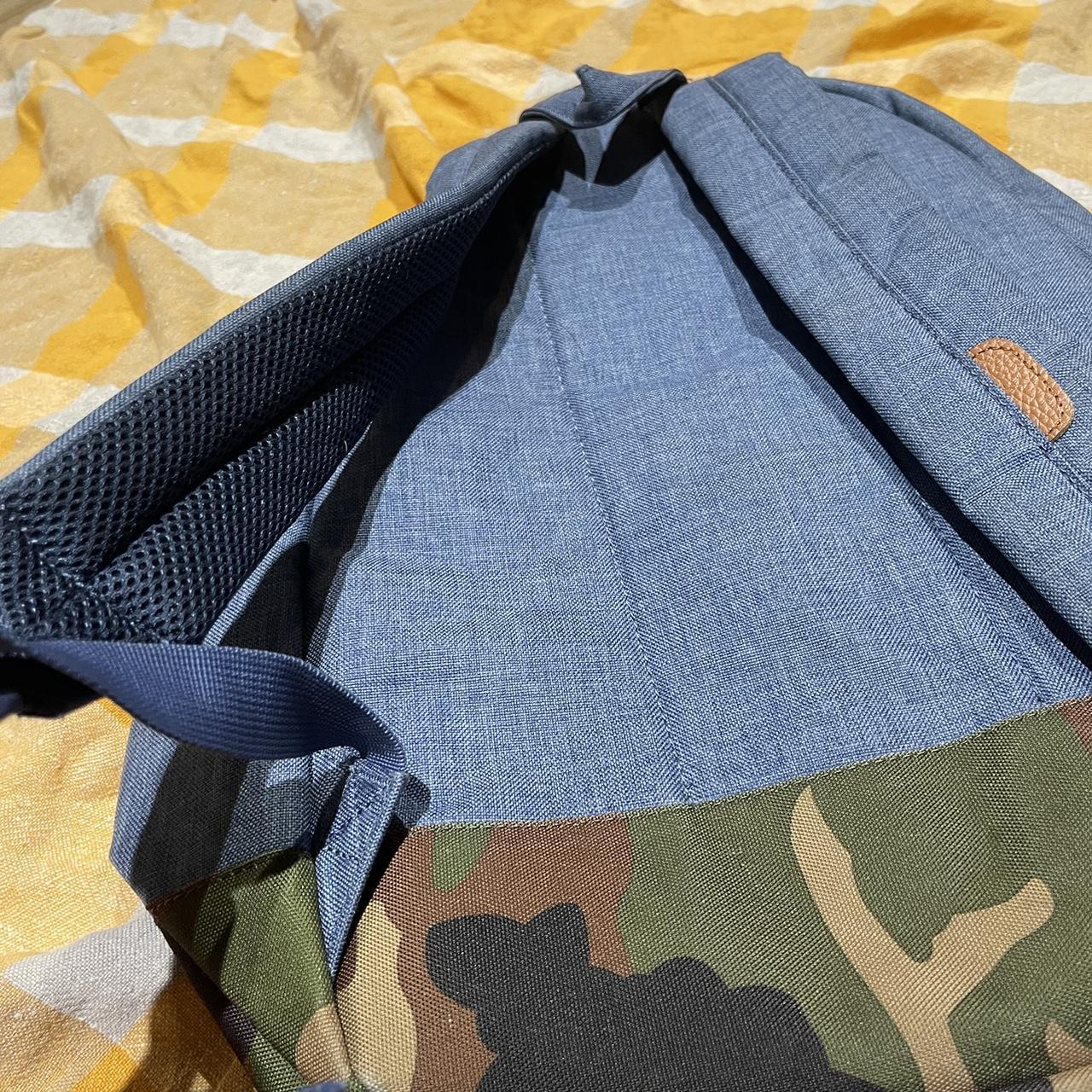 Blue canvas and camouflage Herschel laptop backpack.... Depop