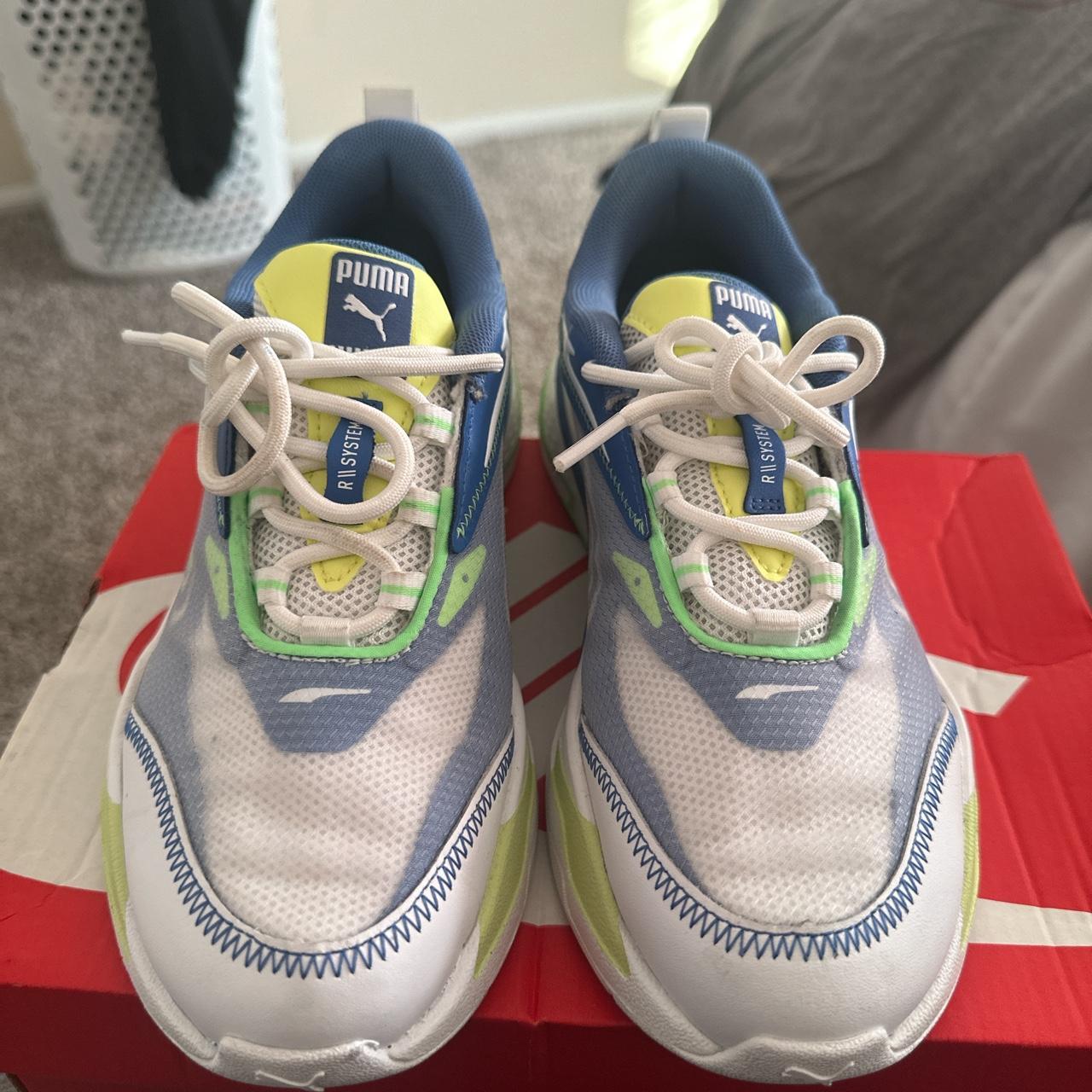 Blue and lime green mulch pumas