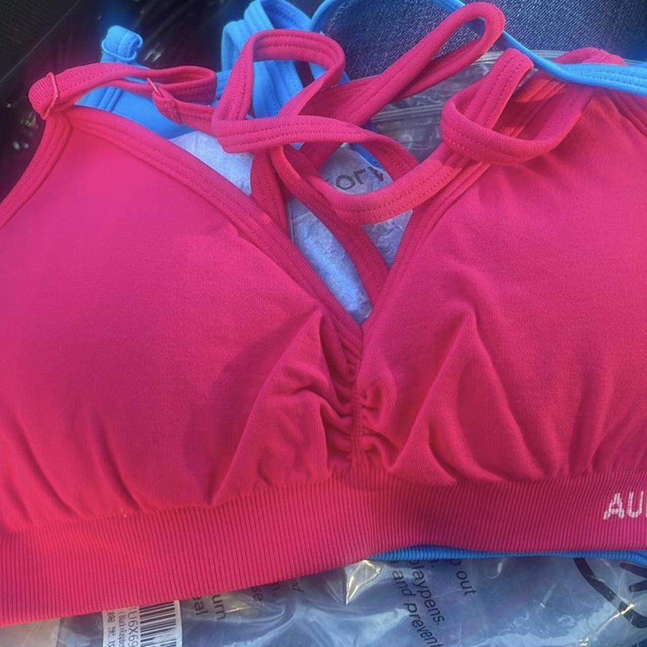 2 pack Aurola Mercury sports bras. Black pink and blue. - Depop