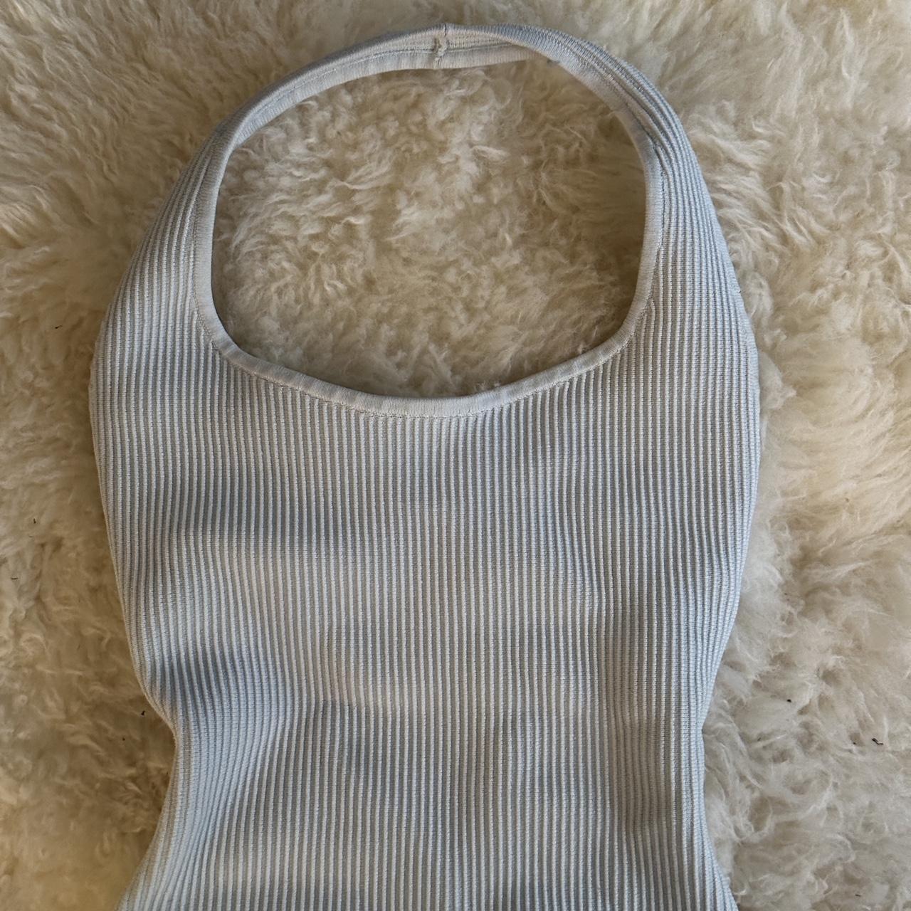 Aritzia baby blue ribbed tank top with loop straps.... Depop