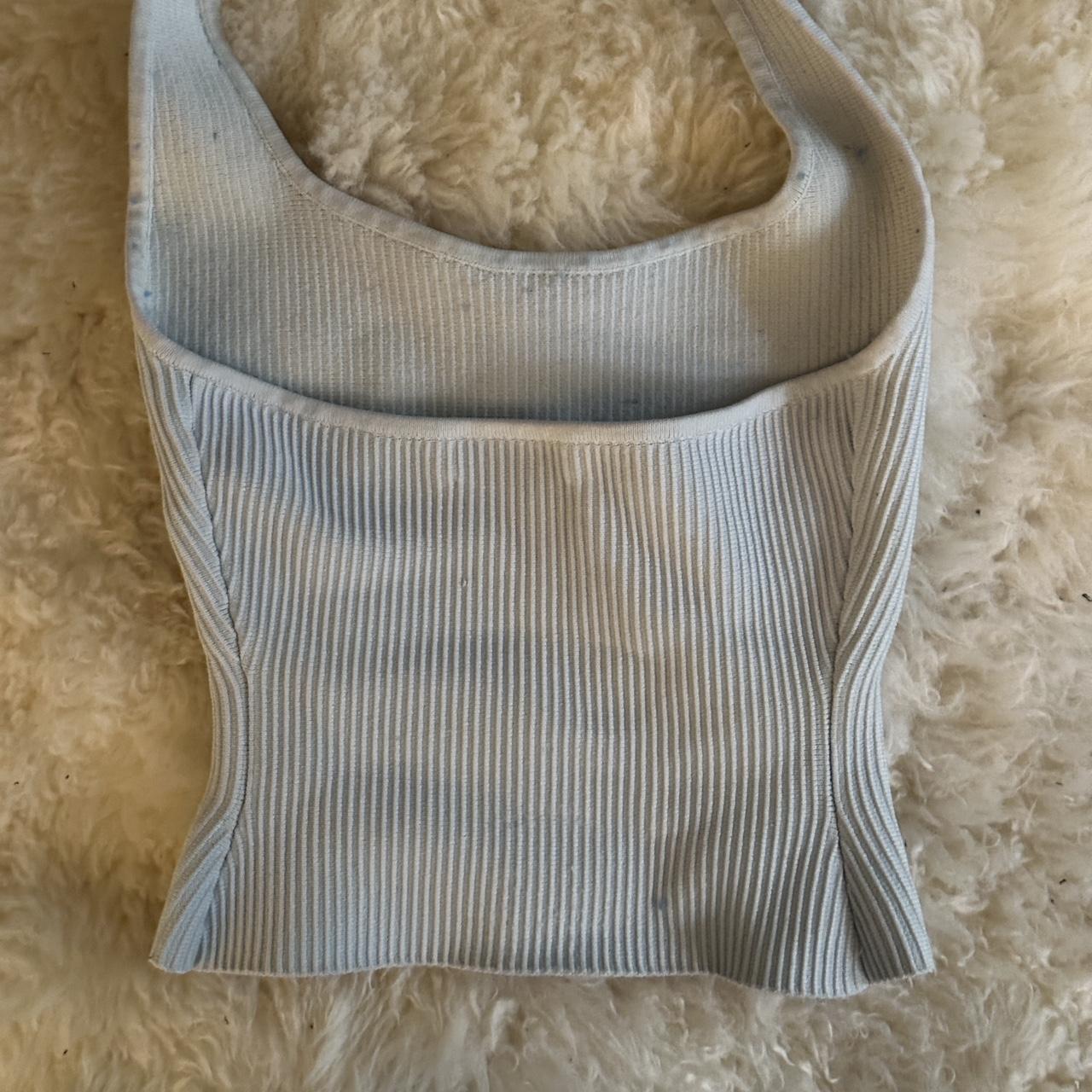 Aritzia baby blue ribbed tank top with loop straps.... Depop