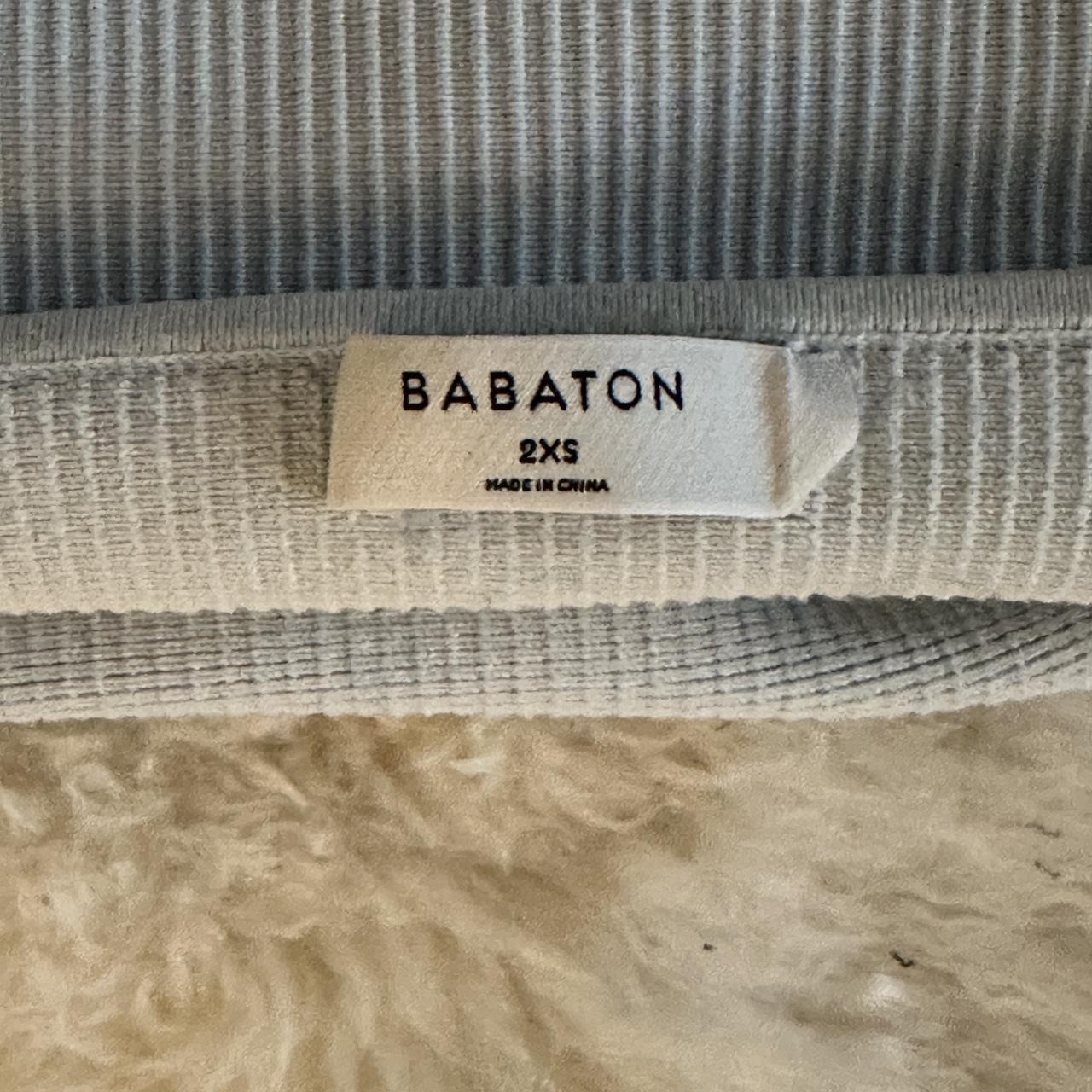 Aritzia baby blue ribbed tank top with loop straps.... Depop