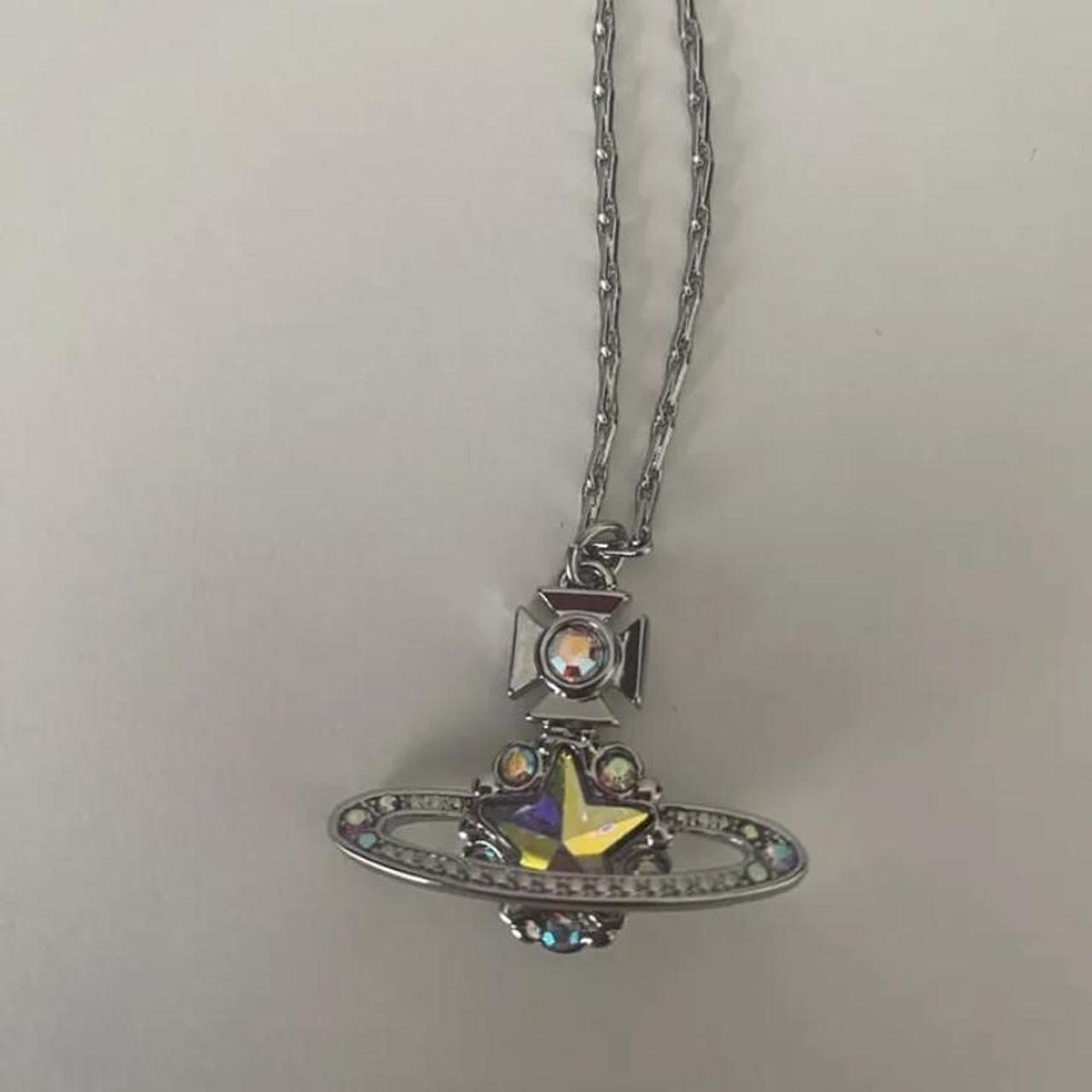 Vivienne Westwood Silver orb Saturn BAS necklace... - Depop
