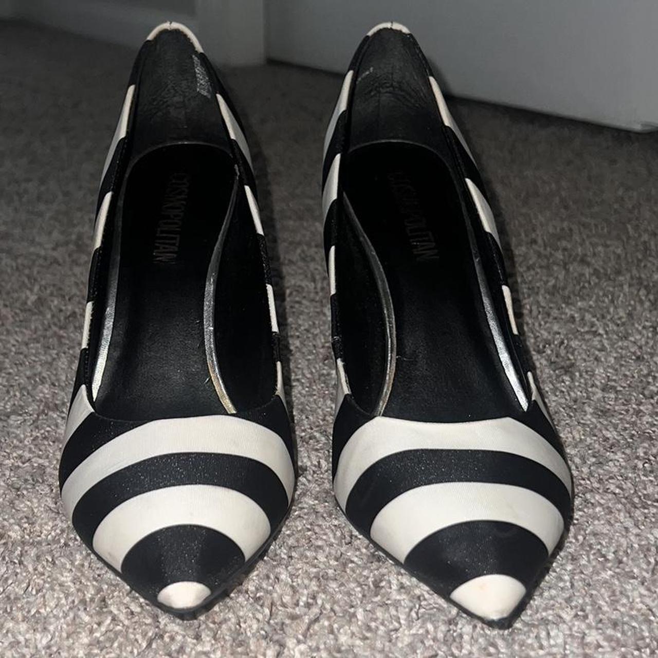 Black and store white striped pumps