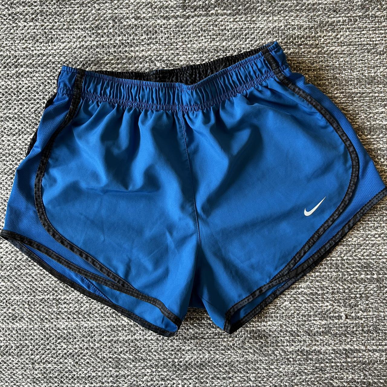 Small blue Nike running shorts (can fit... - Depop