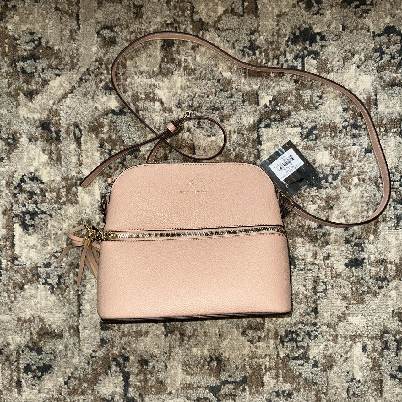 Blush pink cross body bag w/ front zipper pocket. Depop