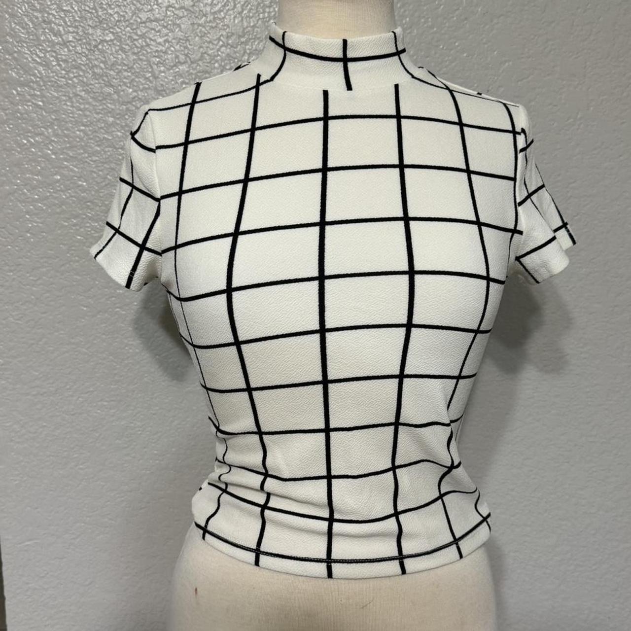 White and black checkered turtleneck top