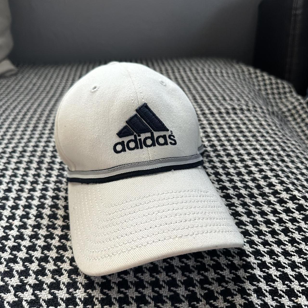 Adidas off white with navy blue accents hat in... - Depop
