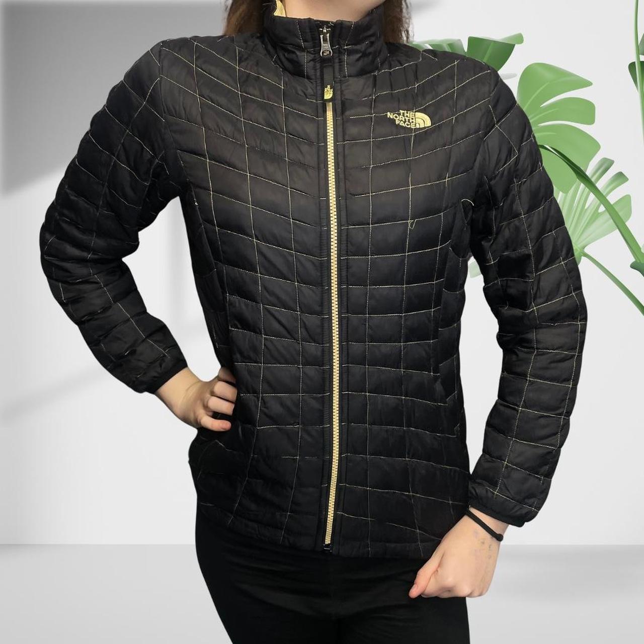 North face black sale and gold jacket