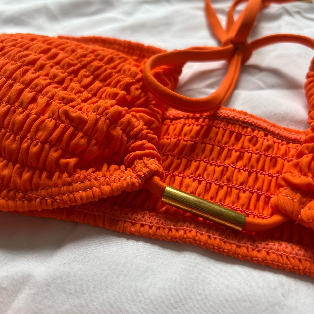 strapless orange bikini set with gold detailing and... Depop