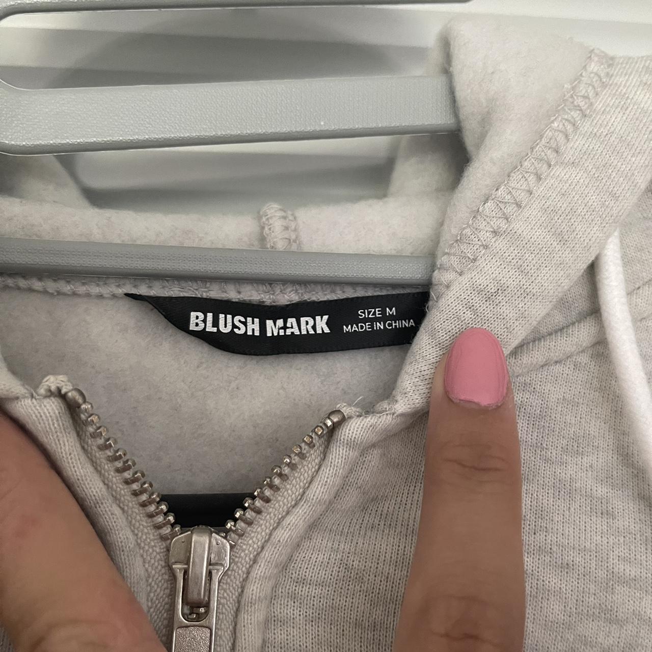 Blush mark cropped zip up, size m. Worn once. Depop