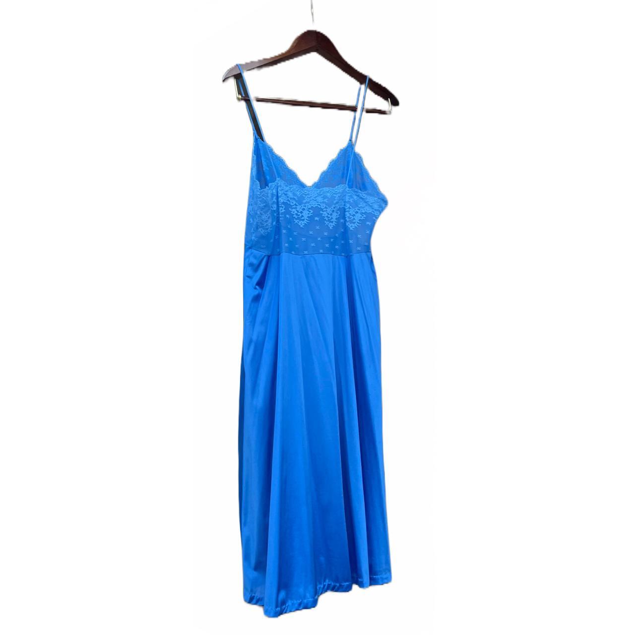 Vanity Fair blue slip with a floral lace bodice and... Depop