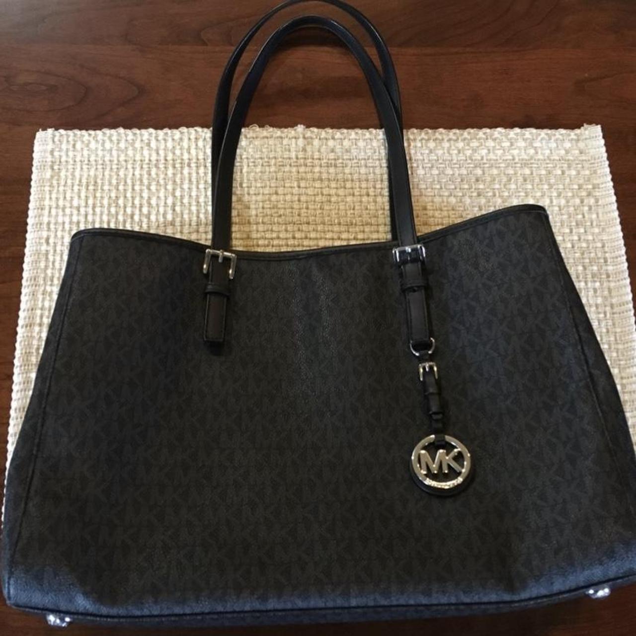 Michael Kors Black And Brown Bag Black and brown MK tote ! Can fit so much - used a... - Depop