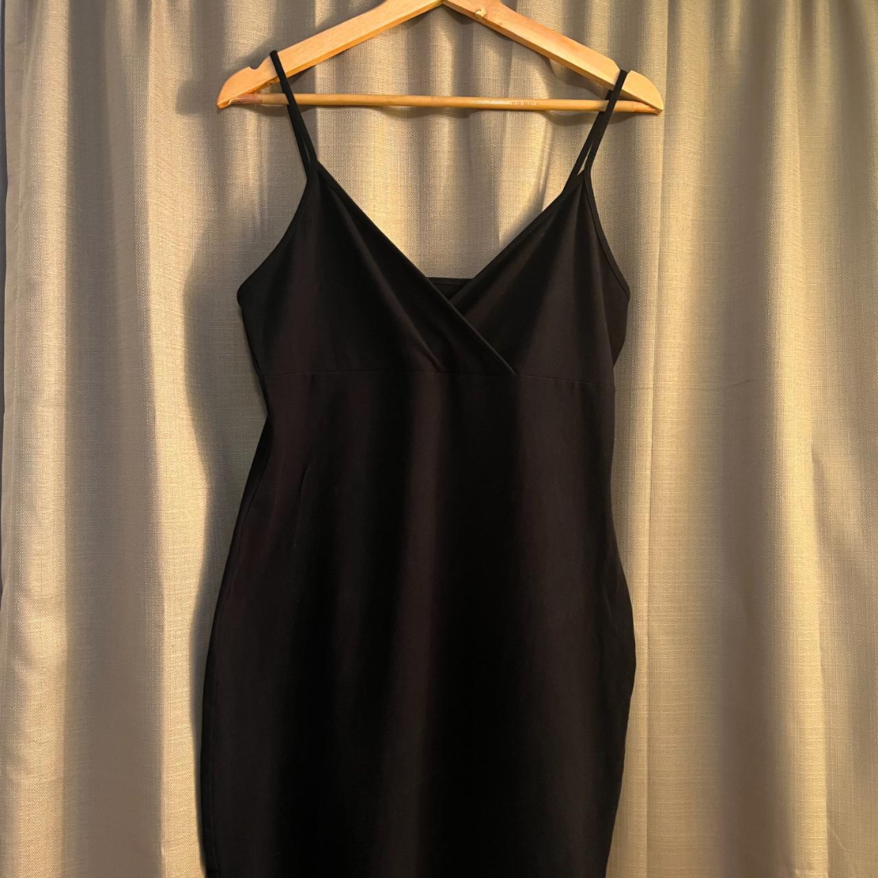 - fitted black dress - about mid thigh... - Depop