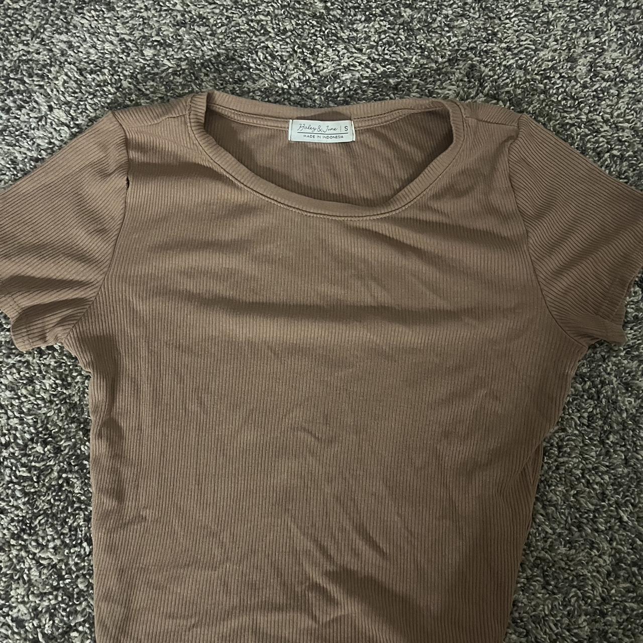 small baby tee, tiny tear in the arm, could be sewed. - Depop