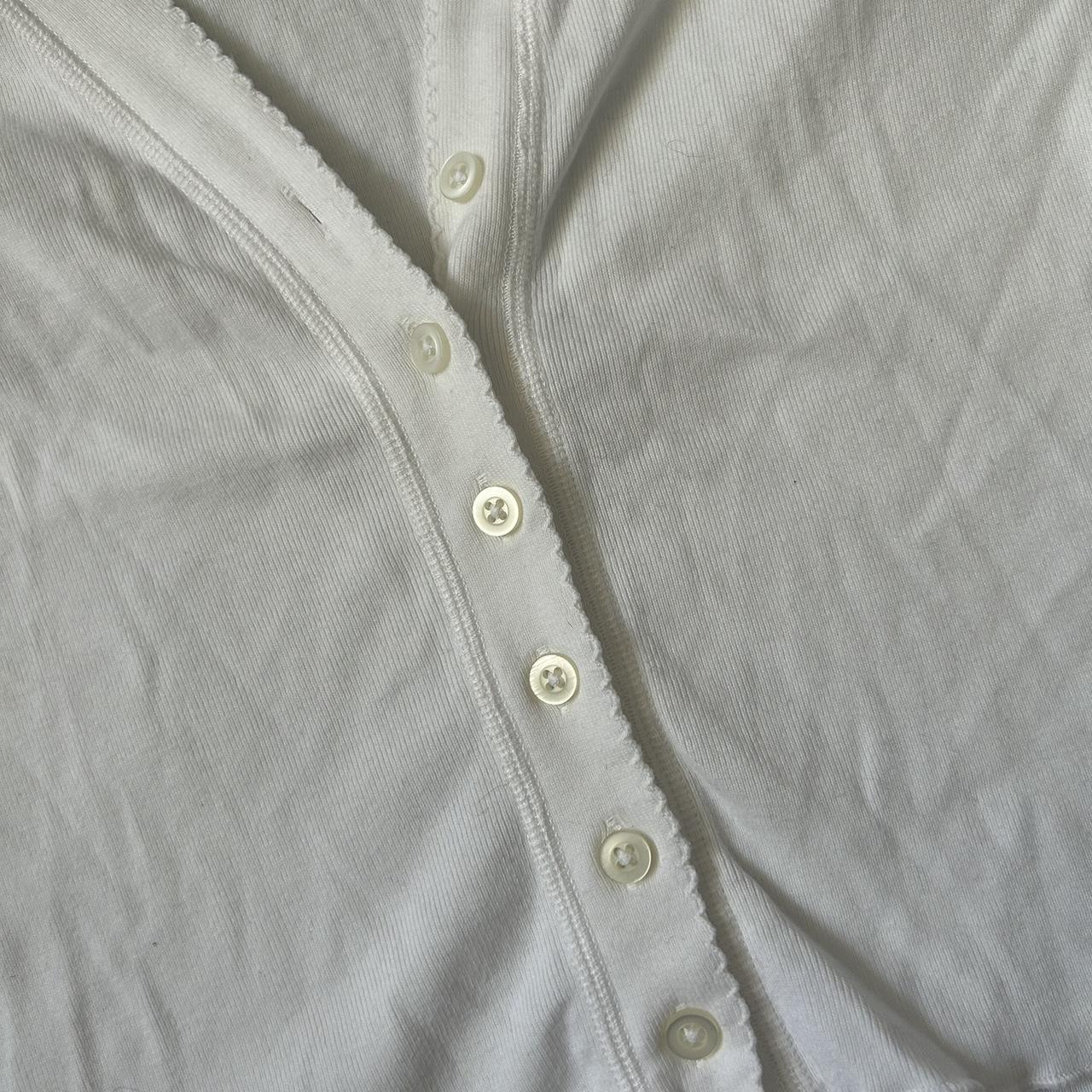 Brandy melville white button up frilly sleeve and... - Depop