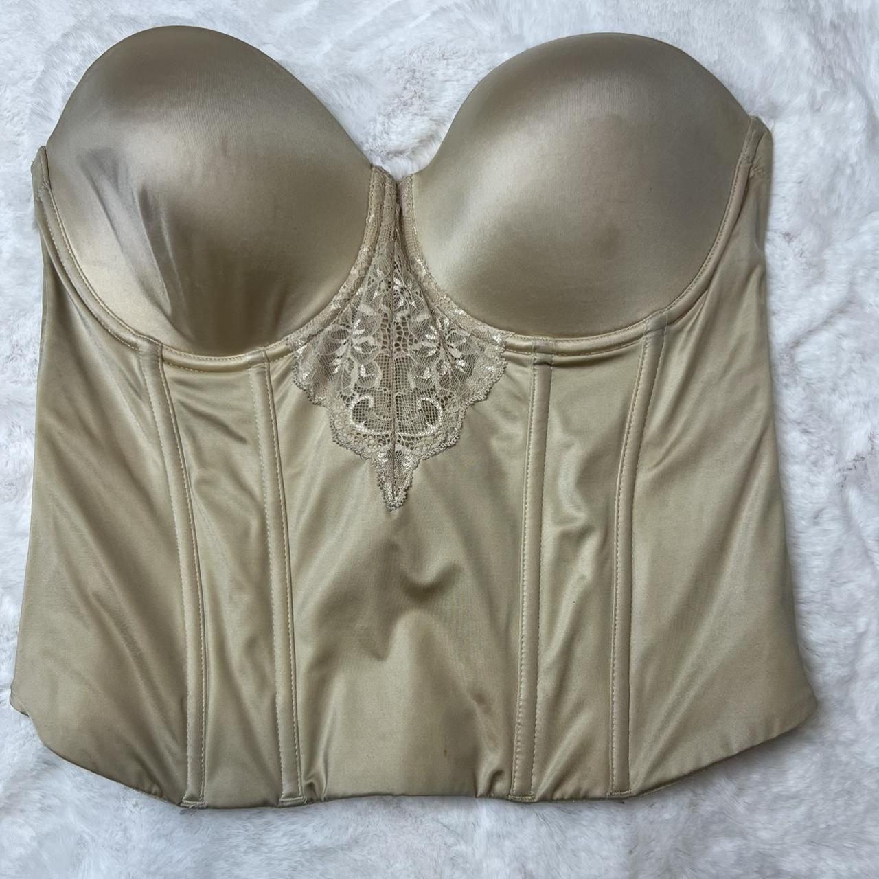Nude corset bra with boning has a little lace in