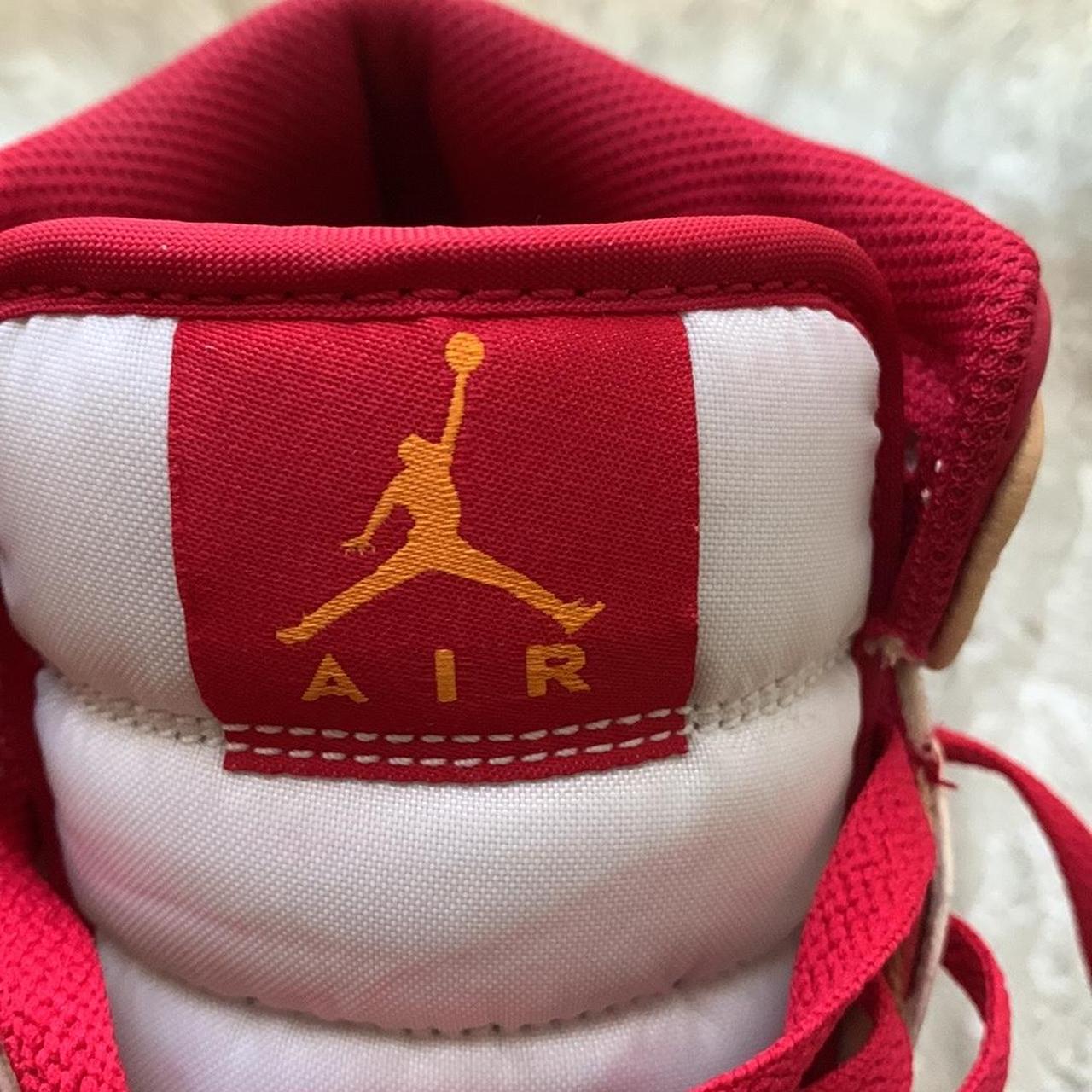 tan and green jordans