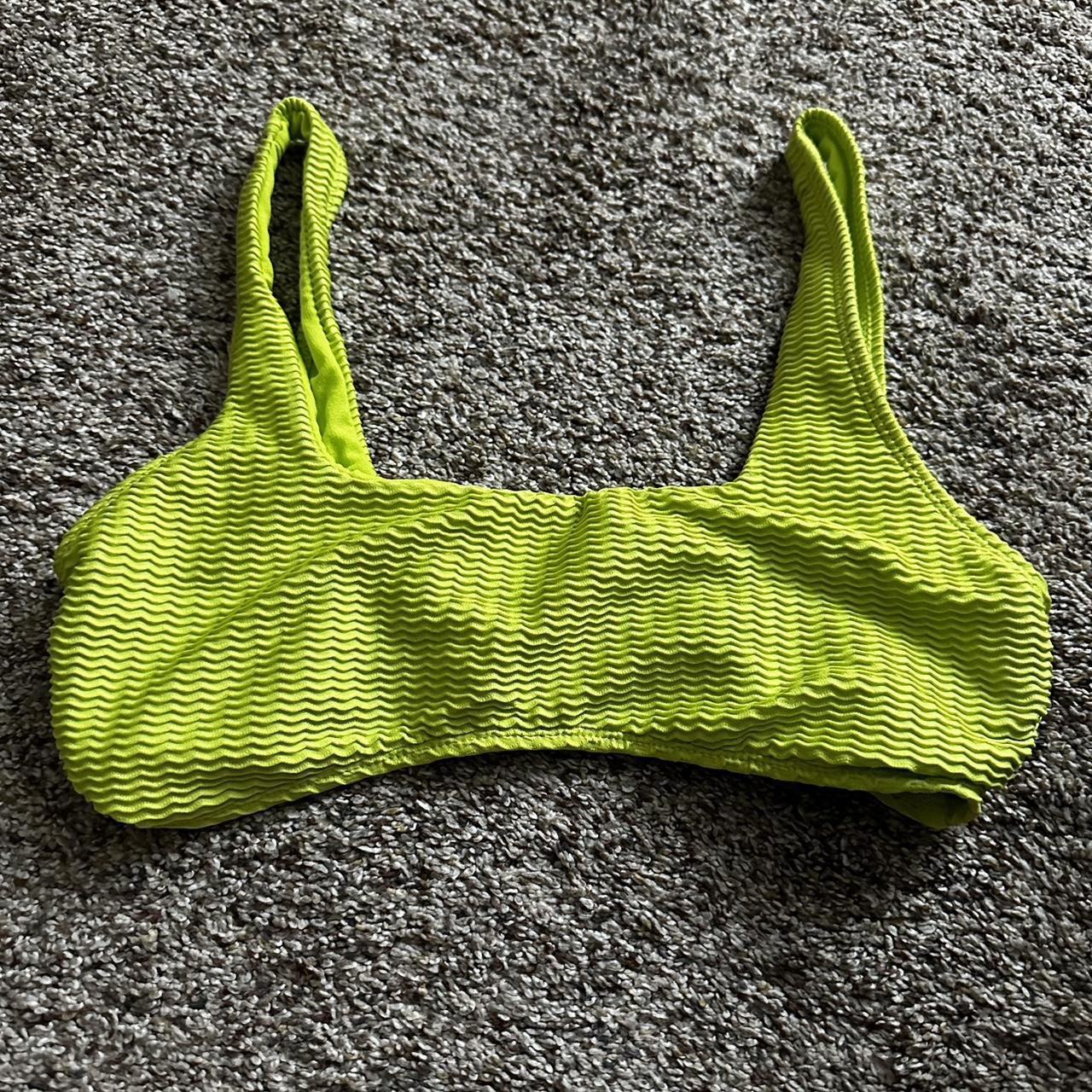Lime green swimsuit top, size large but is a little... Depop