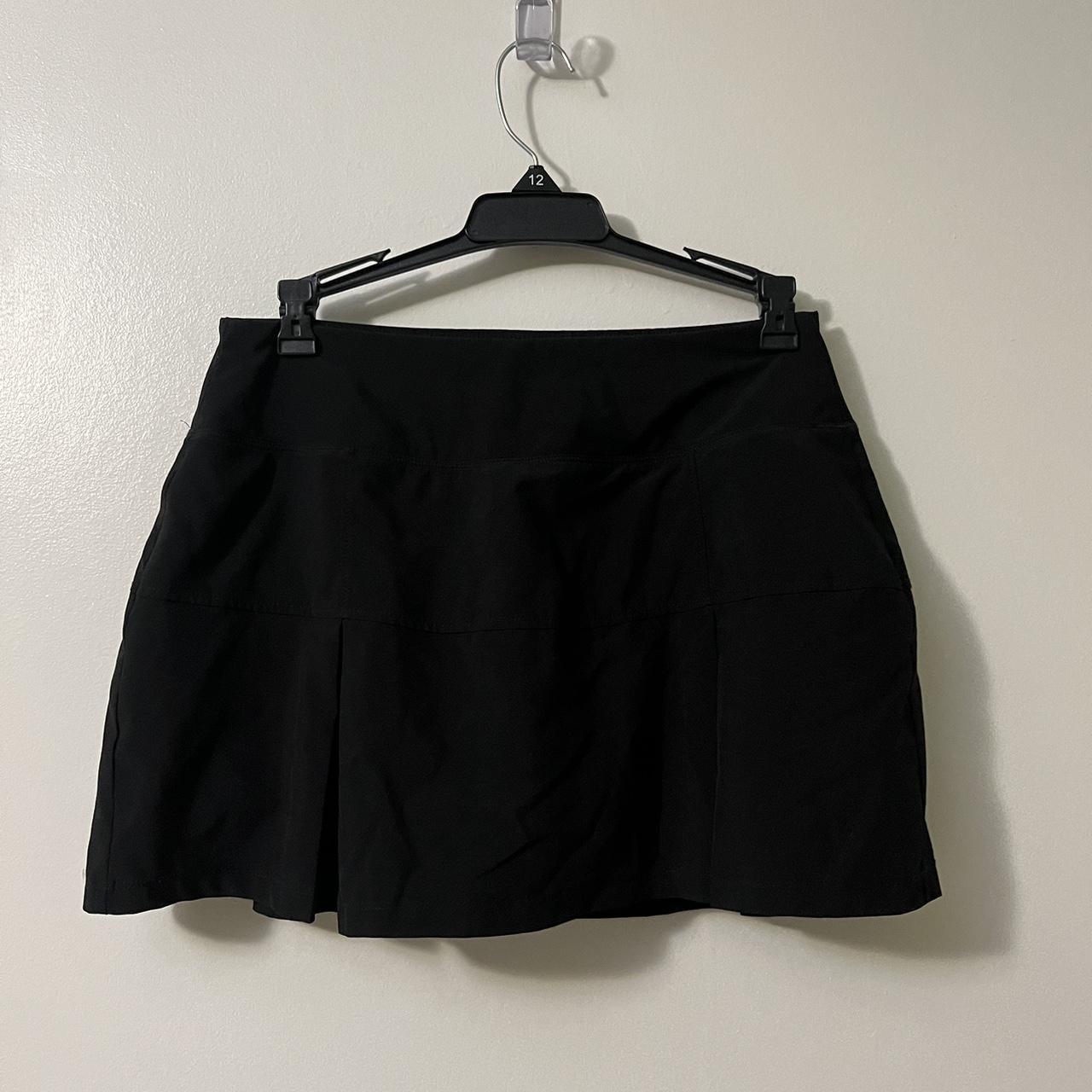 Black athletic skirt has built in shorts inside... Depop