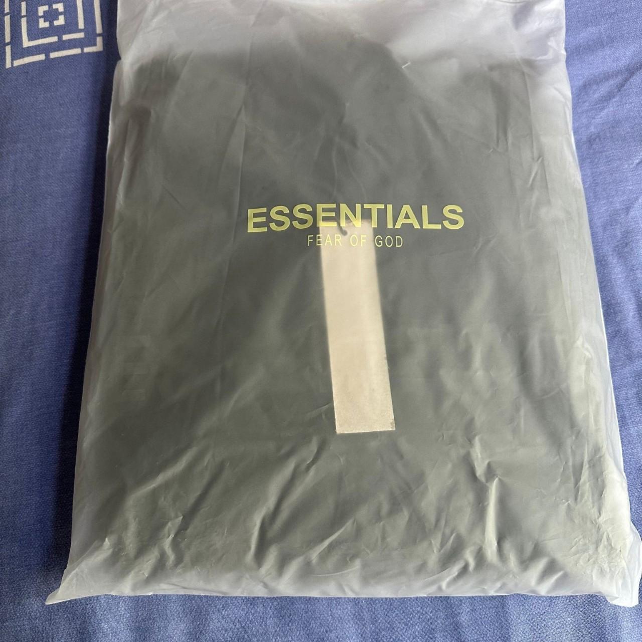 Black Essentials (Fear of God) hoodie Never... - Depop