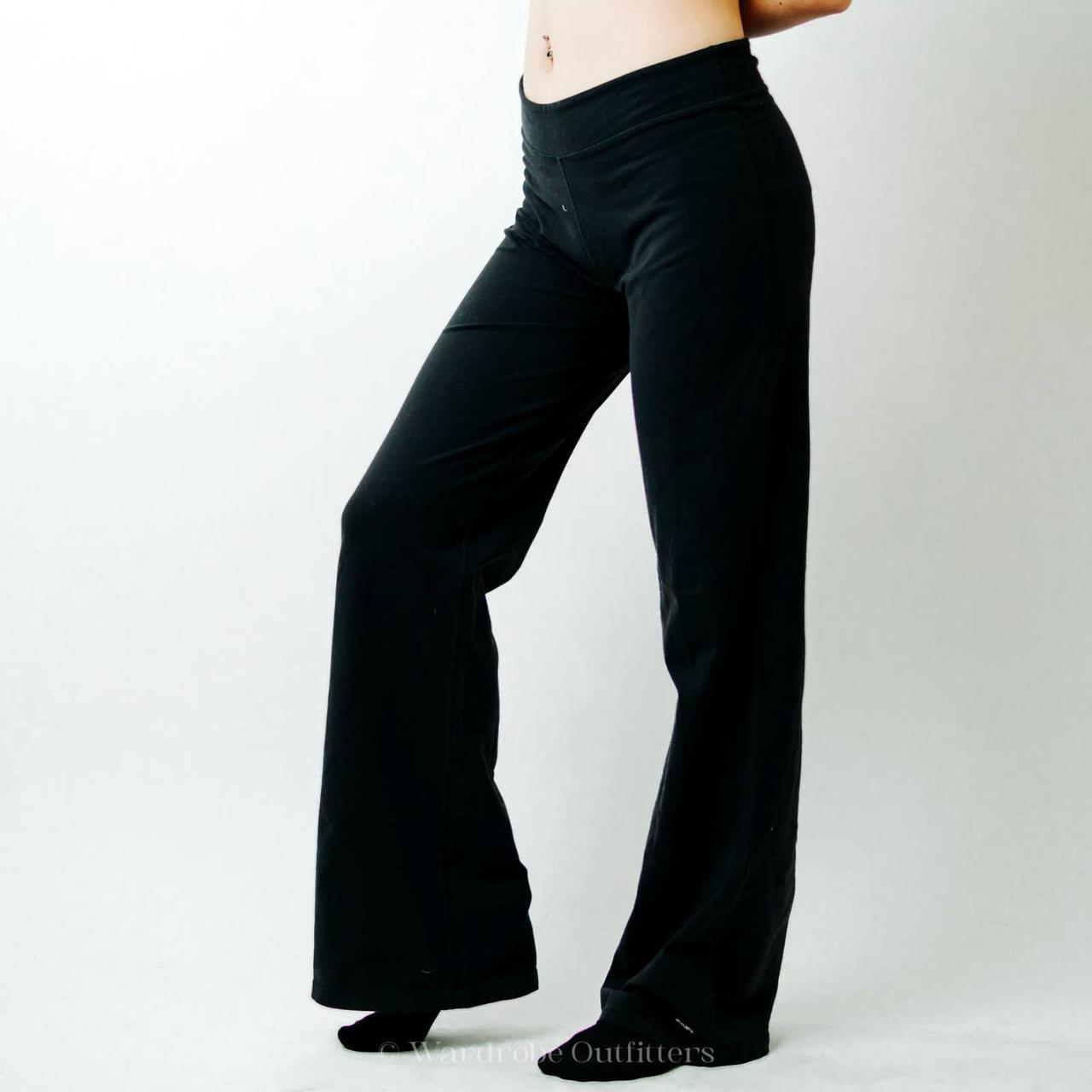 black flare yoga pant leggings in the size medium. - Depop