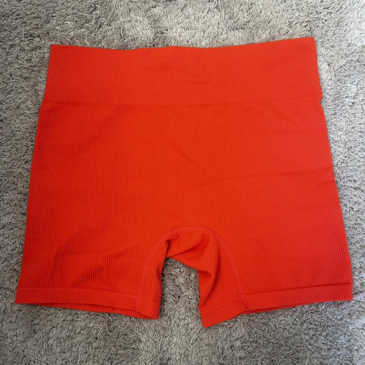 Orange biker shorts. Super stretchy and comfortable.... Depop