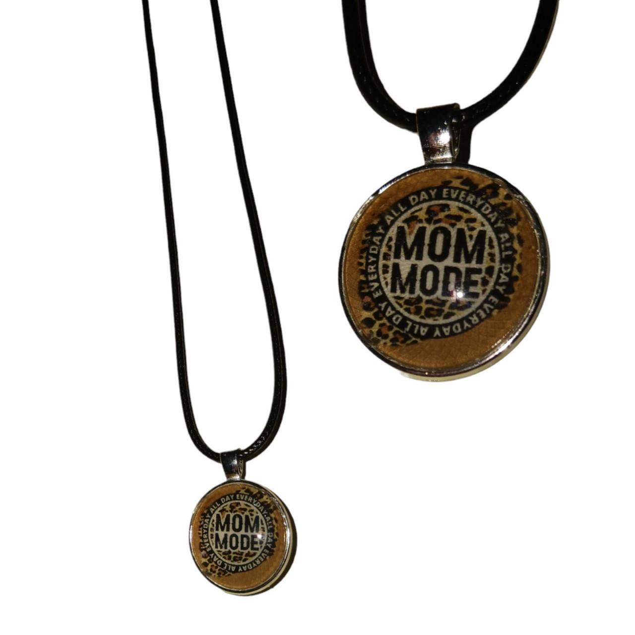 Mom mode necklace on black necklace cord with - Depop