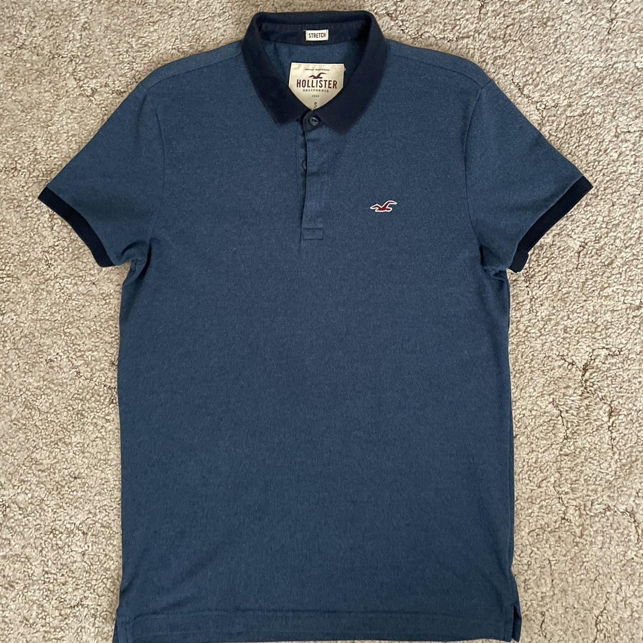 Hollister Co. navy blue polo shirt with a small logo. Depop