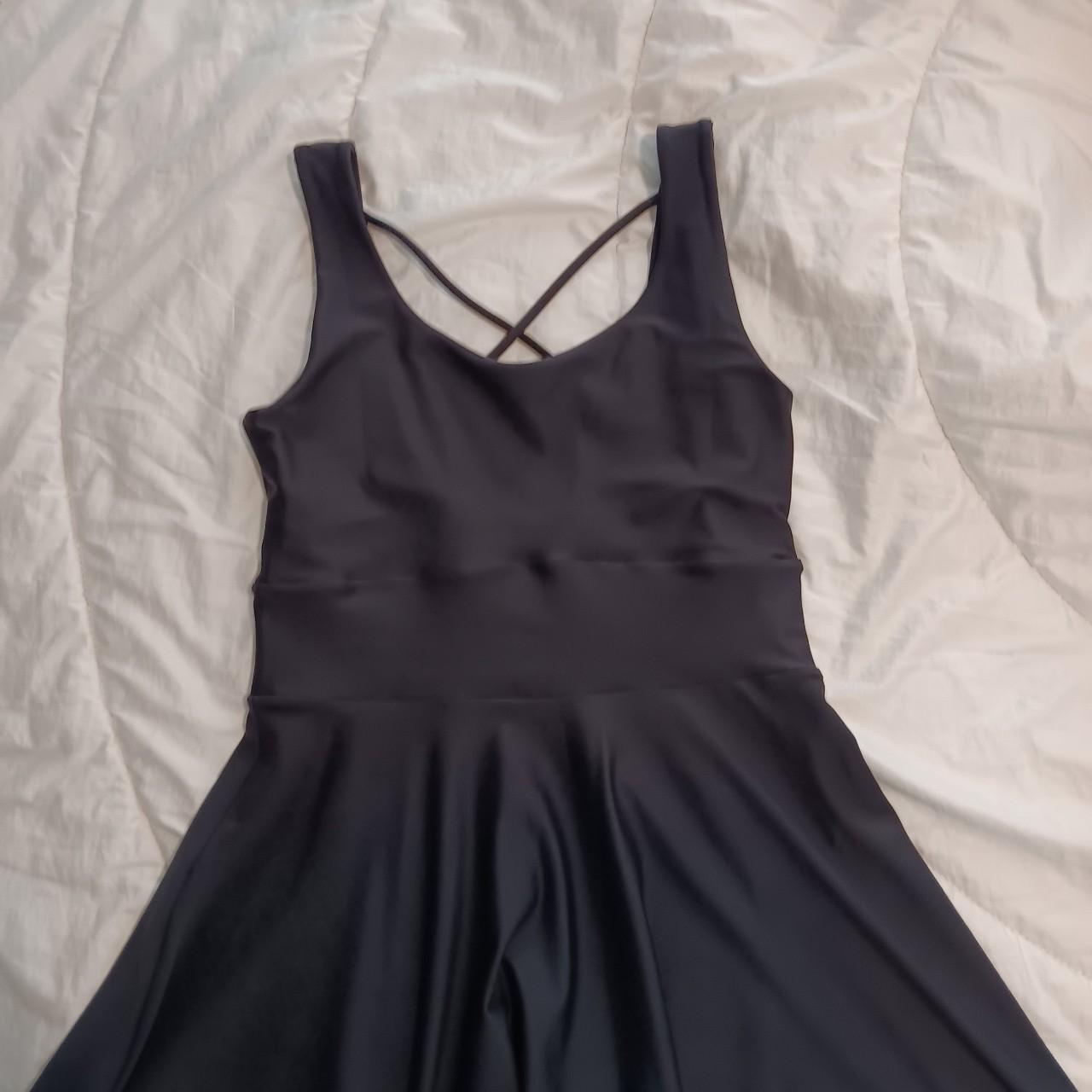 Exotica athletica black midi dress. Re-pop as a bit... - Depop
