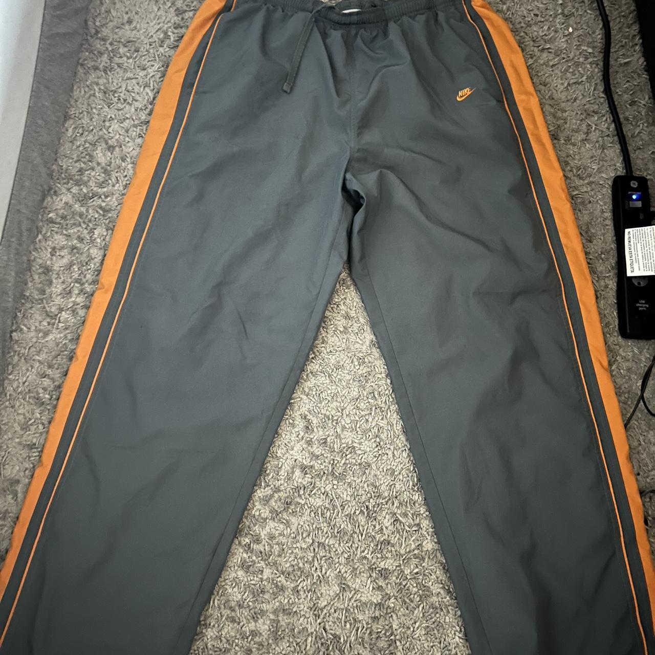 XXL Nike grey and orange track pants no flaws Depop