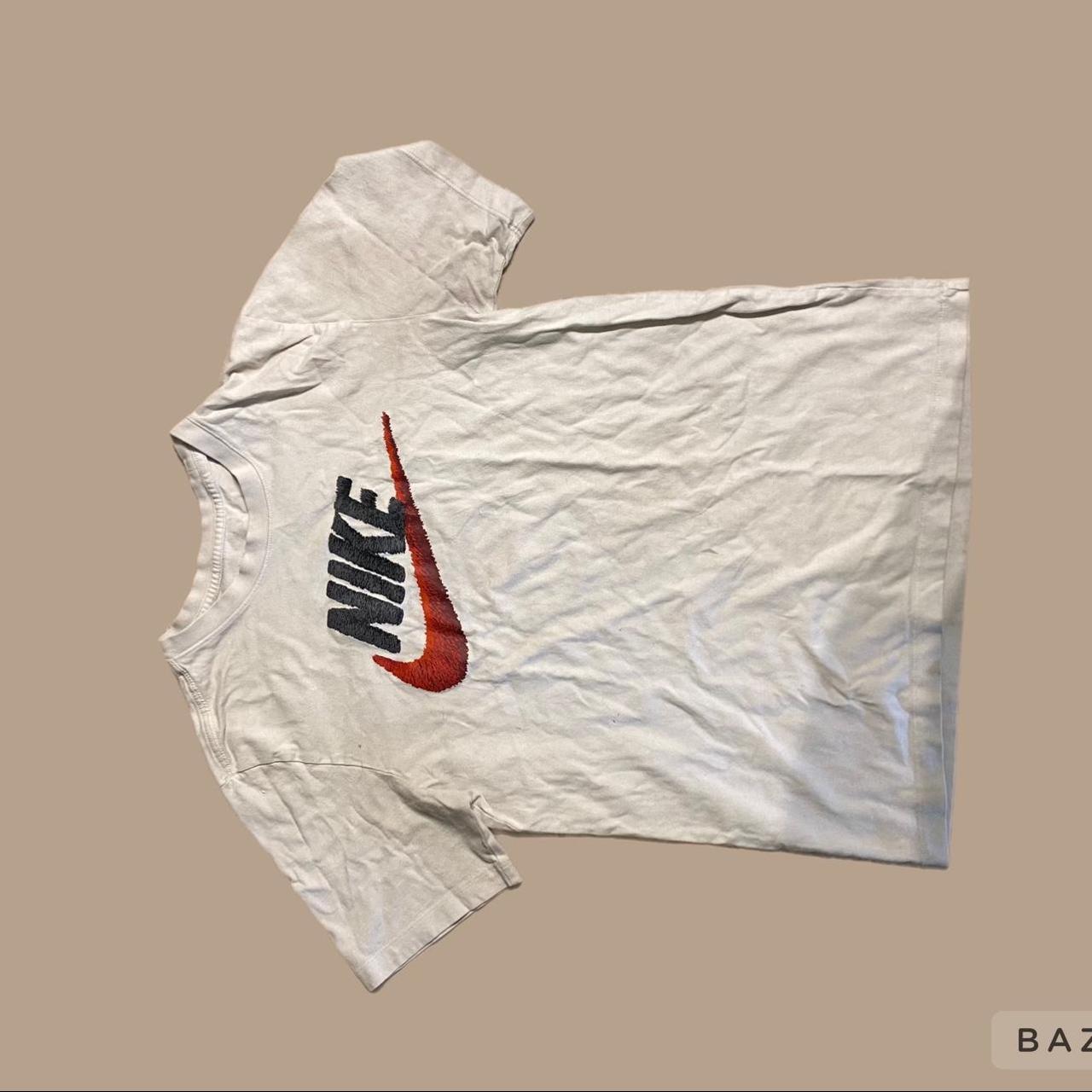 Sz L boys Nike jersey nwt has small rip in front of - Depop