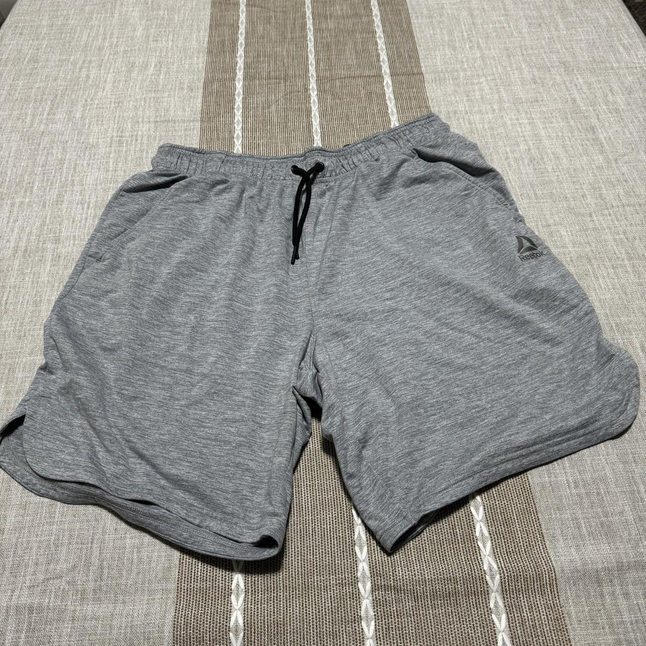 Men's Reebok Shorts Good condition, very small hole - Depop