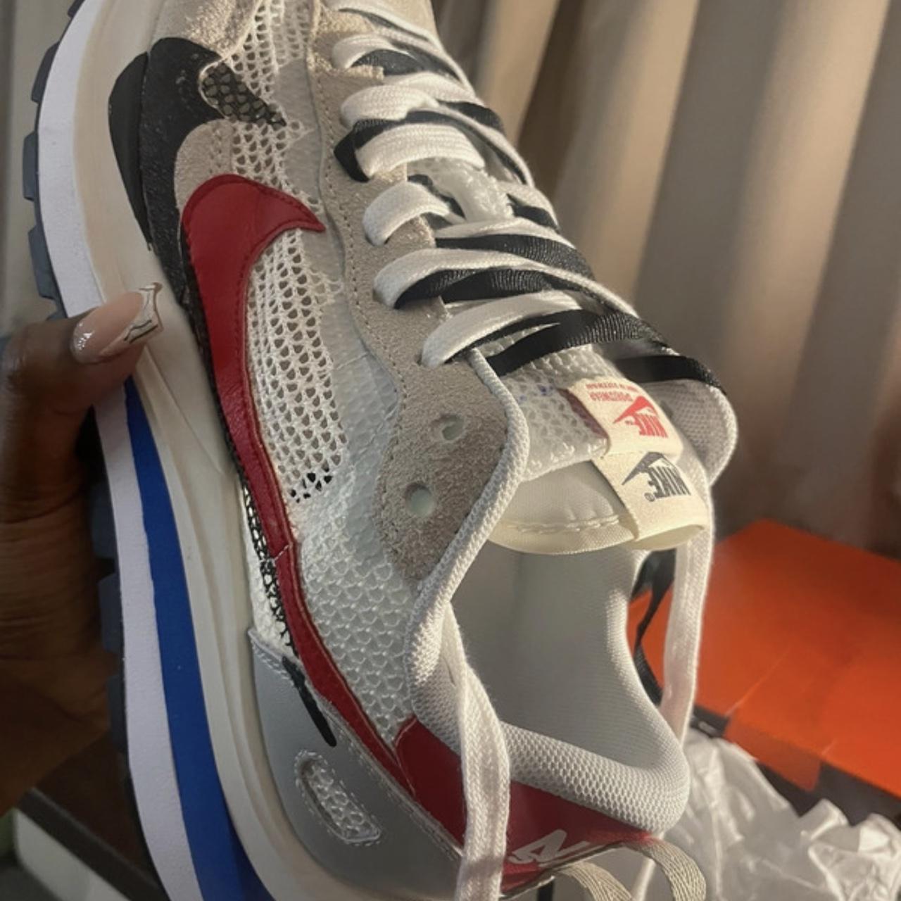 Nike vapor waffle sacai red and blue I think it's Depop