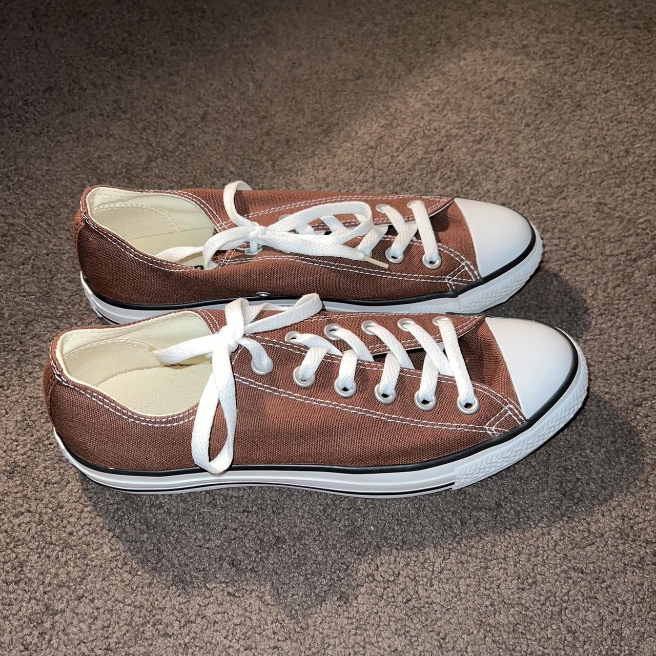 Brown canvas low top converse, worn three... - Depop