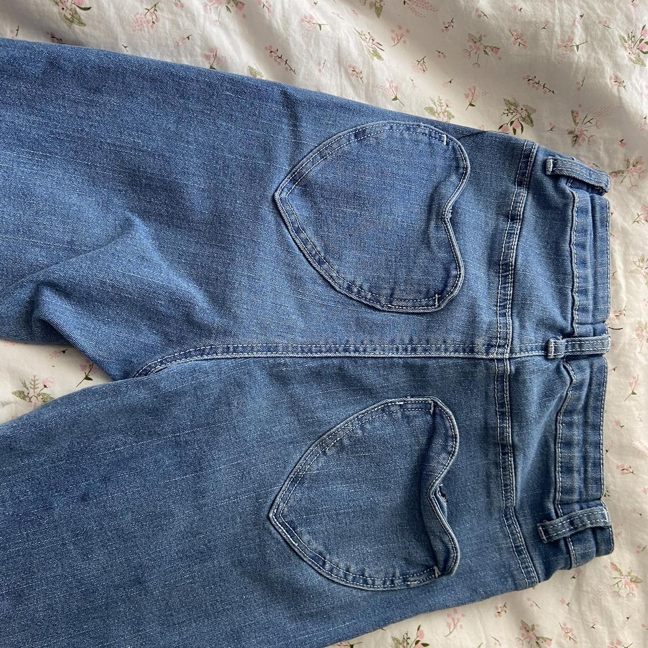 High rise flare jeans with heart shaped pockets - Depop