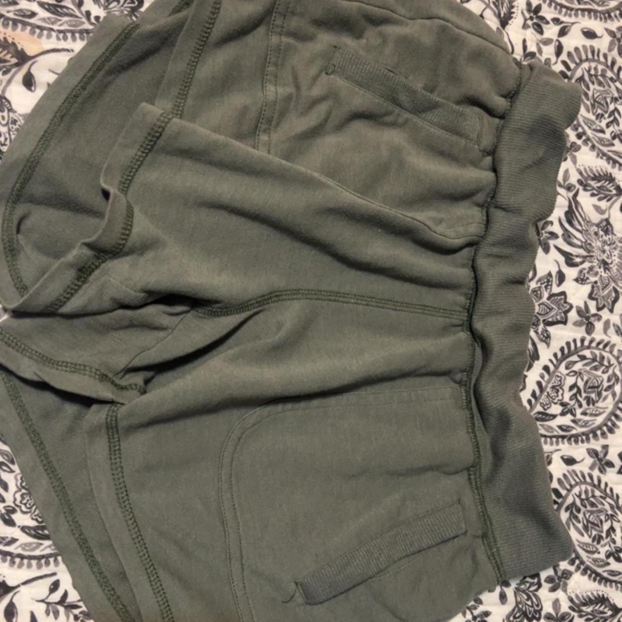 Dark green athletic shorts. xs but stretchy and fits... - Depop