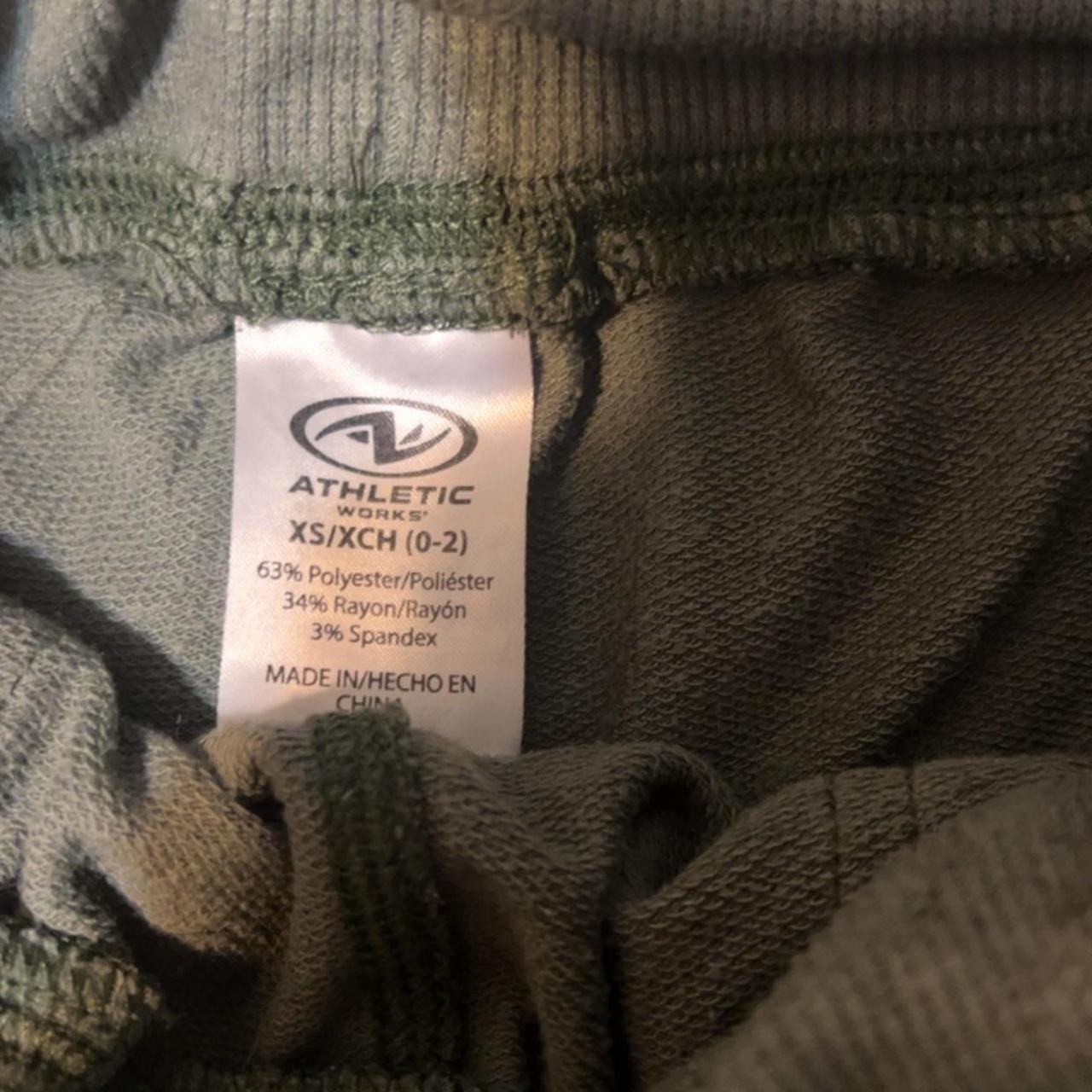 Dark green athletic shorts. xs but stretchy and fits... - Depop