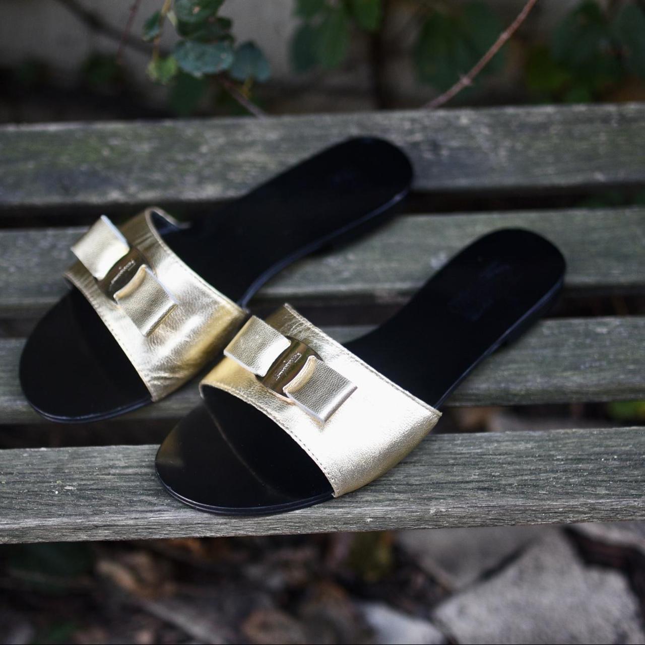 Black and outlet gold ferragamo slides