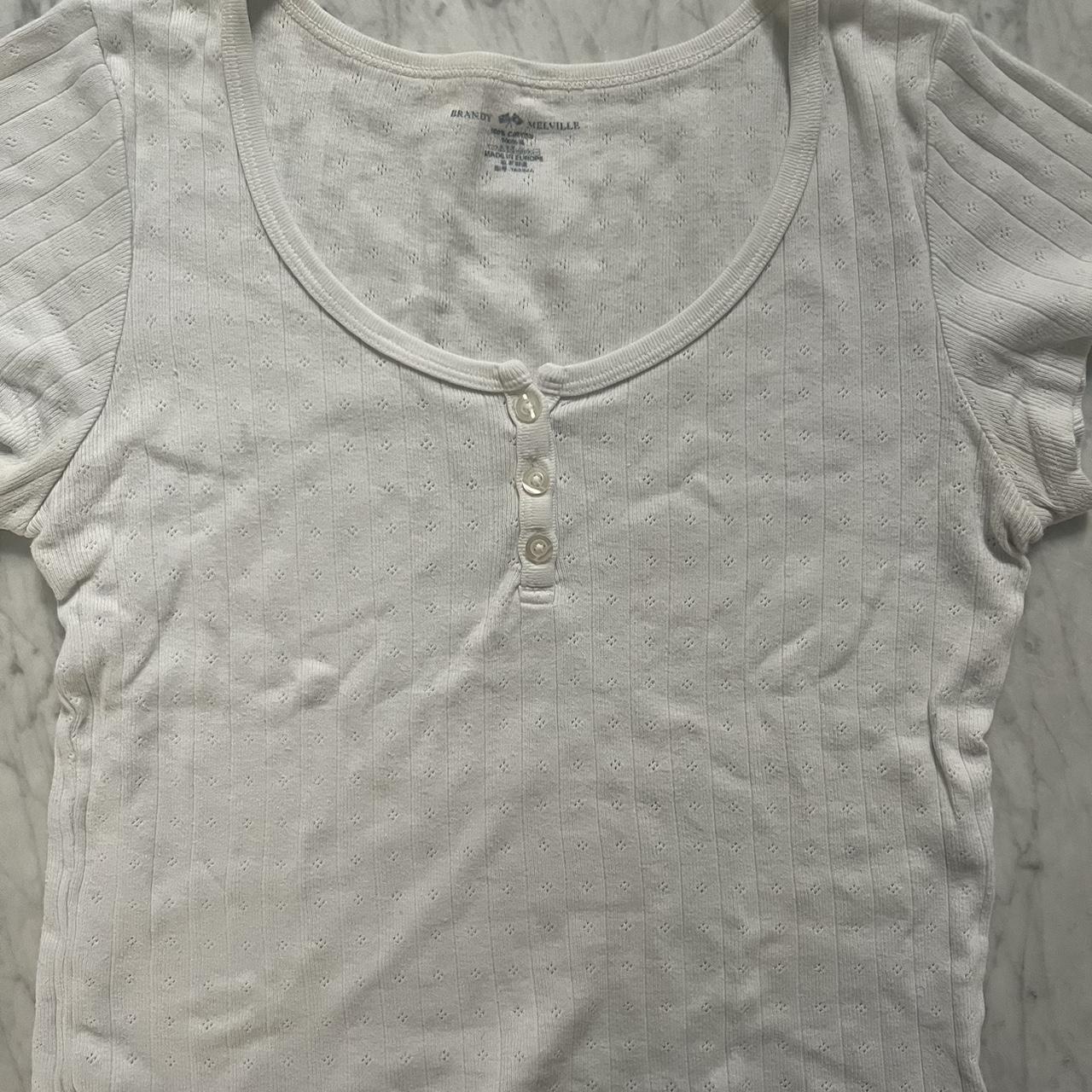 Brandy Melville zelly long eyelet top • worn but in... Depop