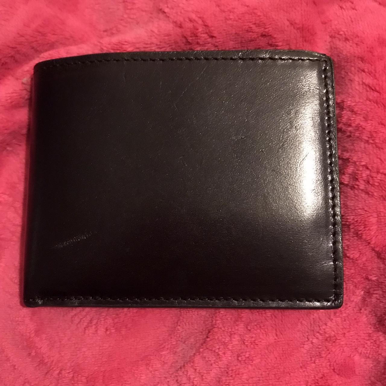 Black leather wallet. Bought from John Lewis for £45... Depop