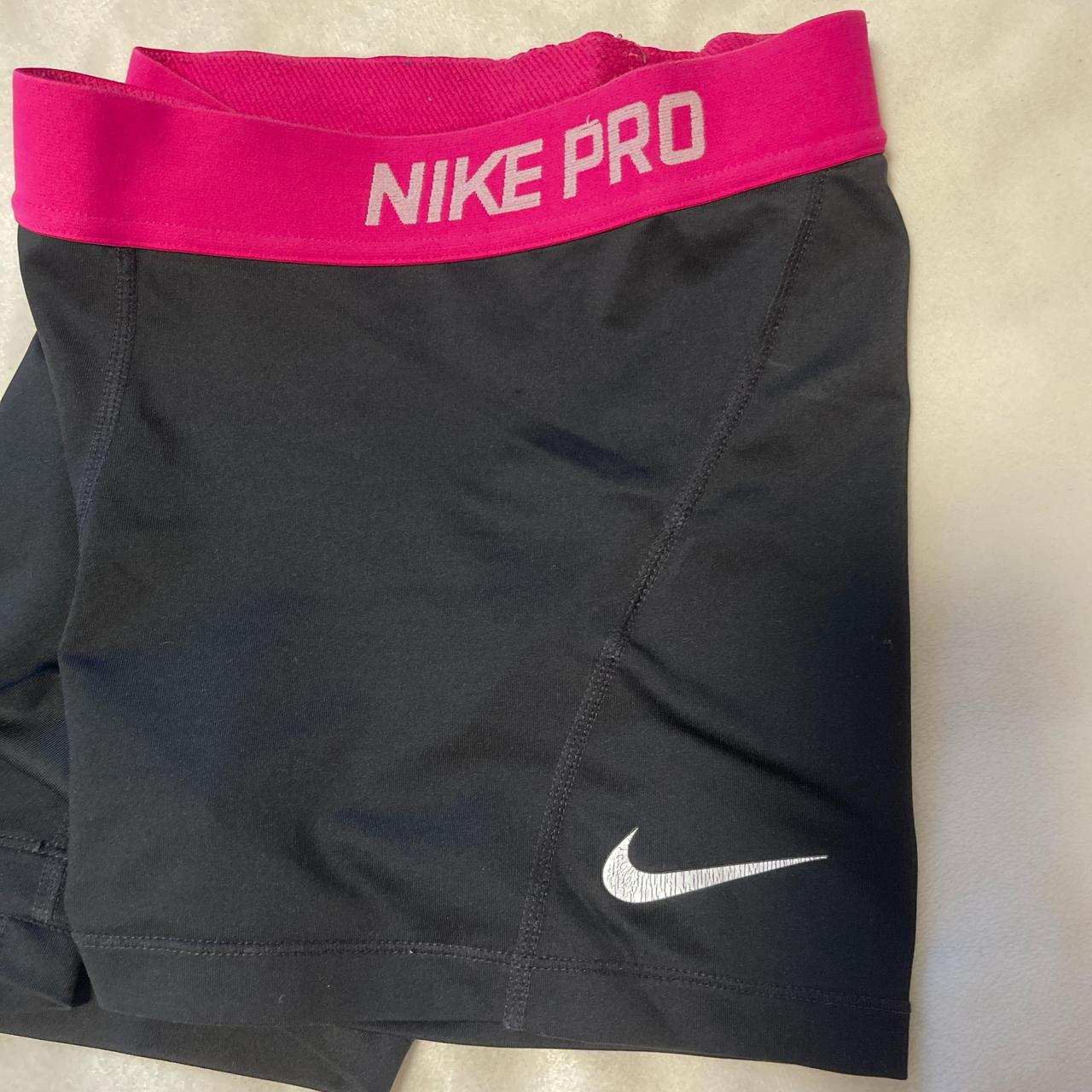 black nike pro shorts with pink band