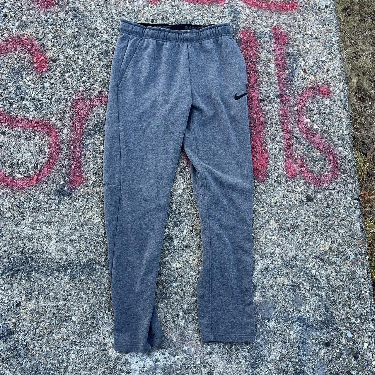 Modern Essential Nike DriFit Sweatpants with... Depop