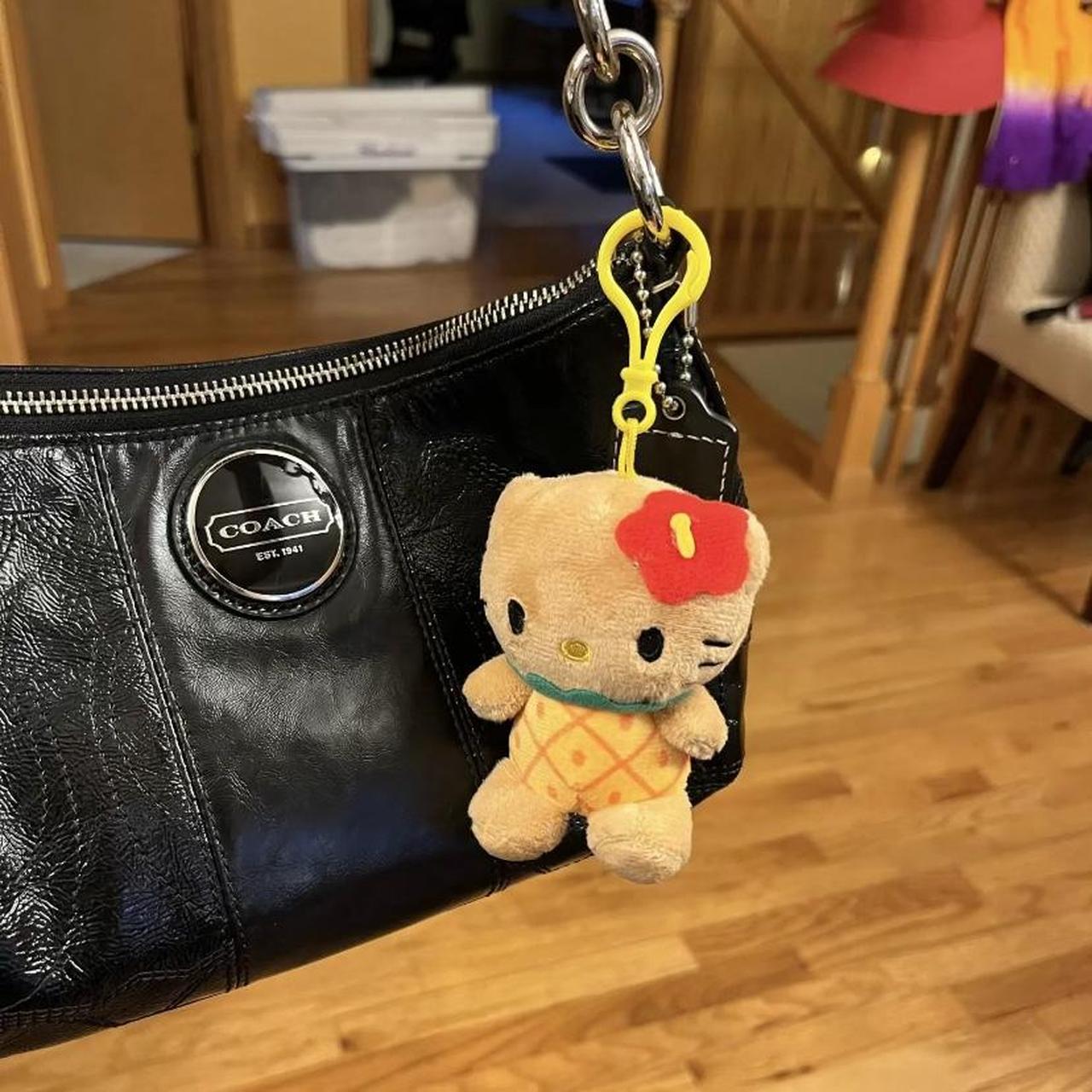 ❀ tan hello kitty keychain ❀ → hawaiian hello kitty