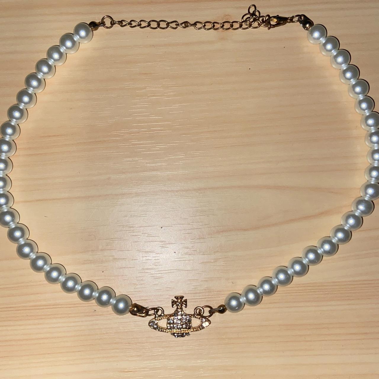 Vivienne Westwood pearl necklace dupe claps is a... - Depop