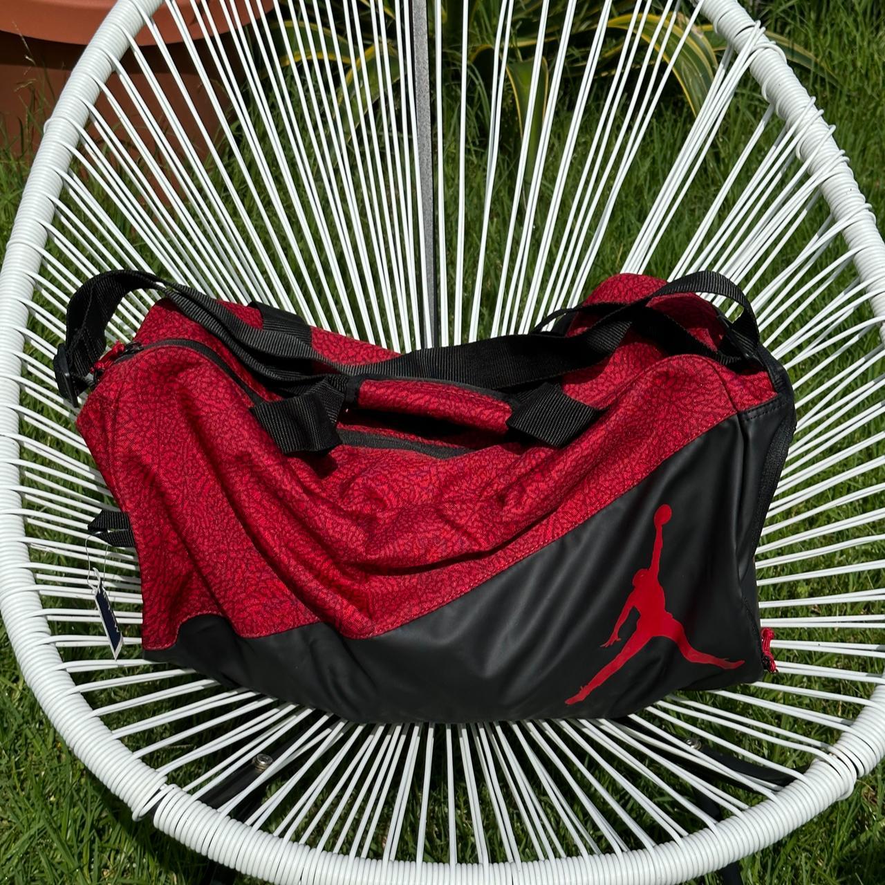 Medium red and black Michael Jordan duffle bag.... Depop