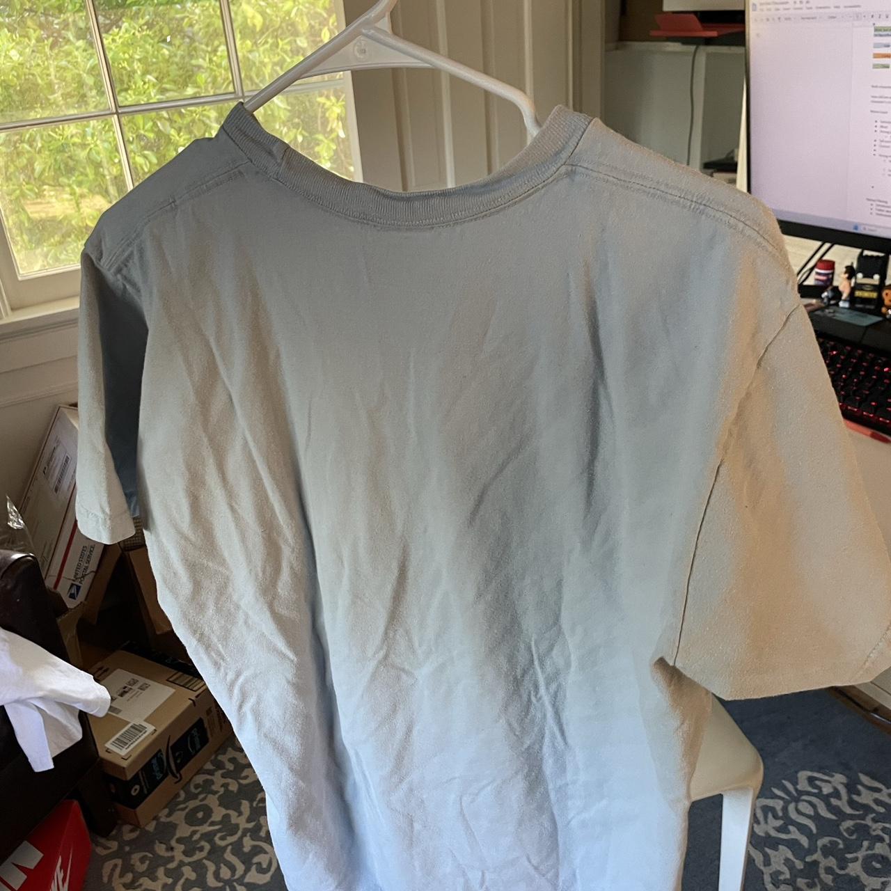 Supreme Dynomite Tee Light Blue Used, cracking as... - Depop