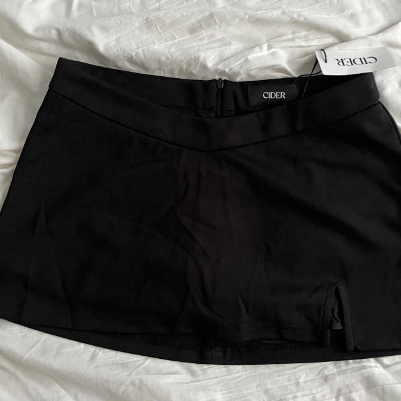 Black Cider Miniskort size medium with zipper... Depop
